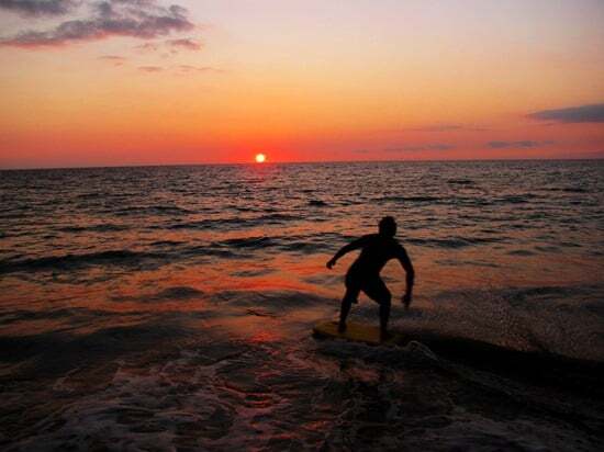 Hapuna skimboarder at sunset